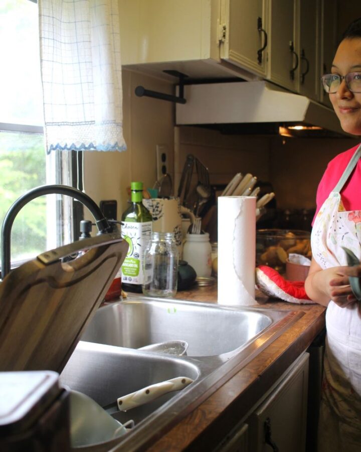 woman smiling in the home kitchen