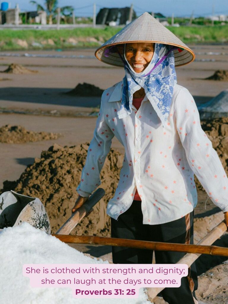 woman smiling at work in salt mine