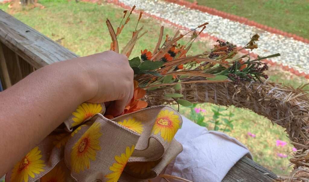 Making a Fall wreath with sunflower bow