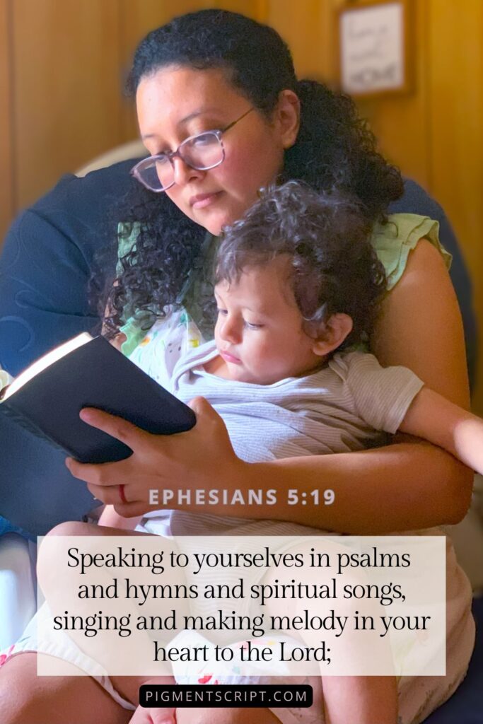 momma and baby at the rocking chair reading the bible